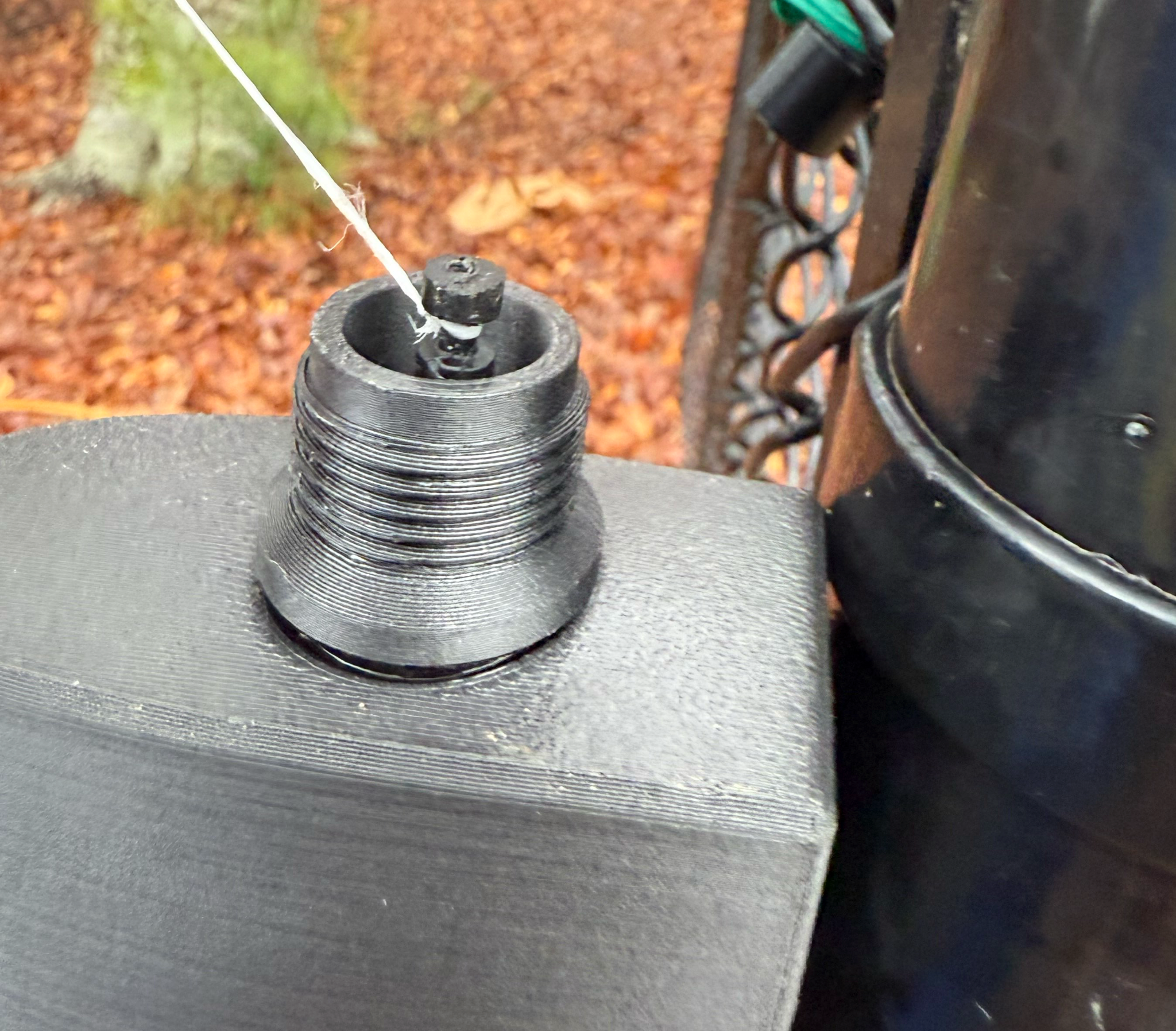 Shaft pulled up through the replacement knob body with floss