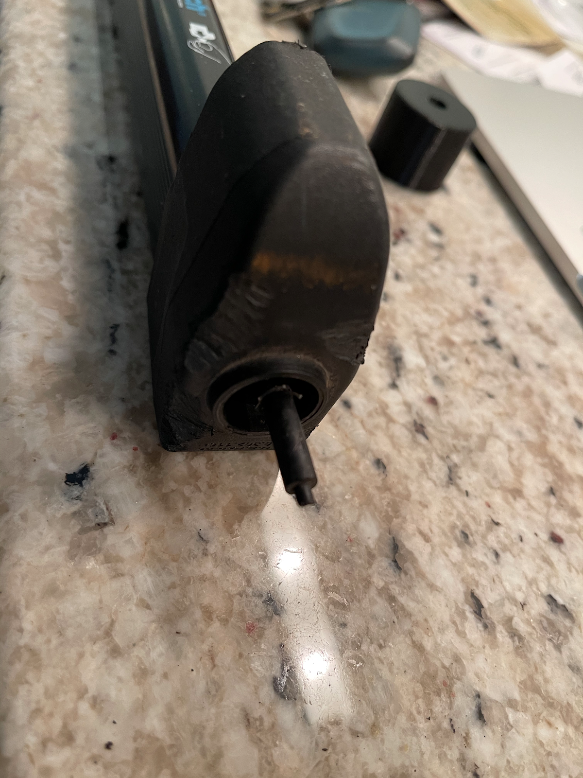 Pulling the damaged rod out of the lock body with pliers