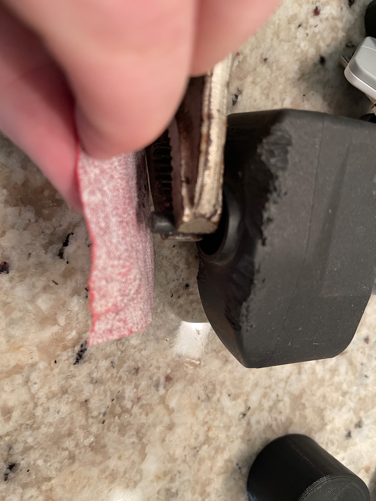 Sanding the shaft end flat